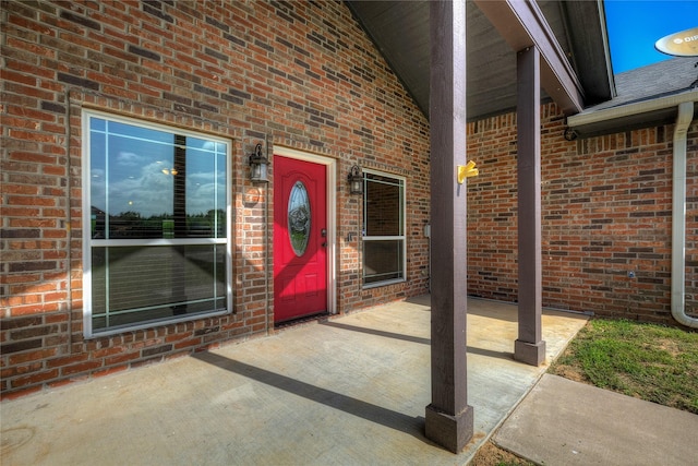 doorway to property featuring a patio