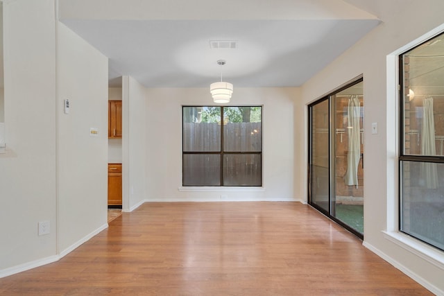 empty room featuring light hardwood / wood-style floors