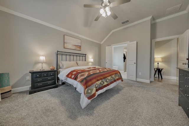 carpeted bedroom with ornamental molding, lofted ceiling, and ceiling fan