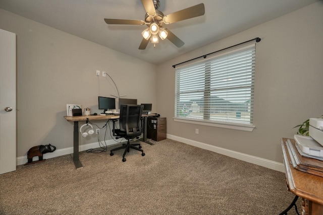 home office with carpet floors and ceiling fan