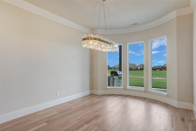 121 Ford Ct, Weston, TX 75009 - unfurnished room with light wood finished floors, ornamental molding, baseboards, plenty of natural light, and a chandelier