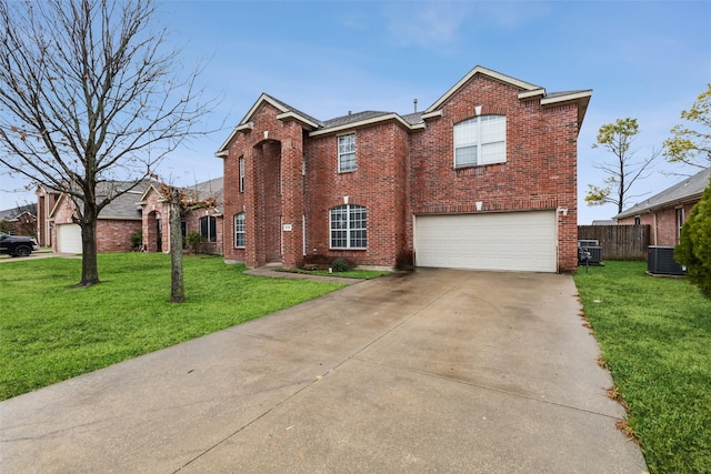 view of front of property featuring central AC unit, a garage, and a front yard