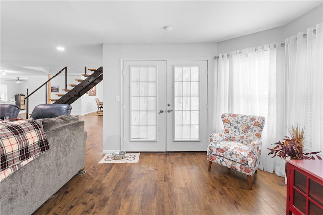 entrance foyer featuring dark hardwood / wood-style floors and french doors