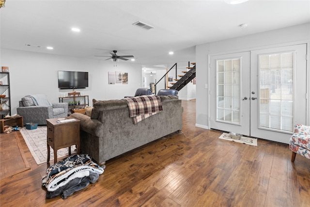 living room with french doors, ceiling fan, and dark hardwood / wood-style flooring