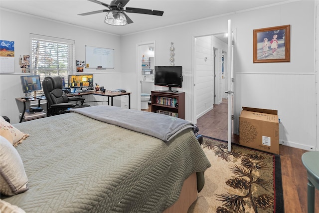 bedroom with wood-type flooring, ornamental molding, and ceiling fan