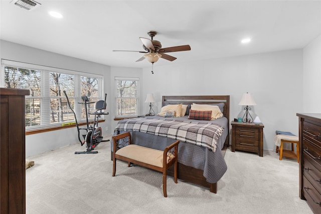 carpeted bedroom featuring ceiling fan