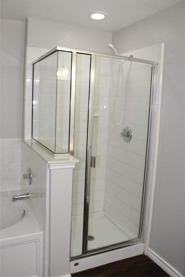 bathroom with independent shower and bath