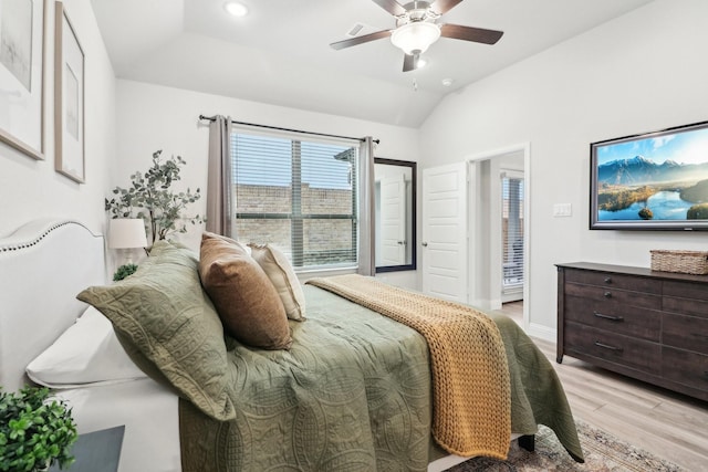 bedroom featuring light wood finished floors, baseboards, a ceiling fan, lofted ceiling, and recessed lighting