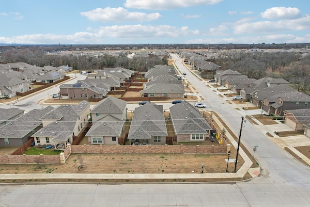 birds eye view of property with a residential view