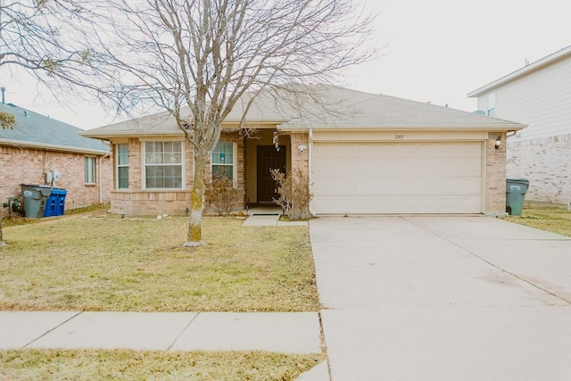 single story home with a front yard, an attached garage, brick siding, and driveway