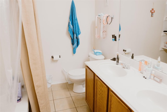 bathroom with toilet, a sink, a shower with shower curtain, tile patterned flooring, and double vanity