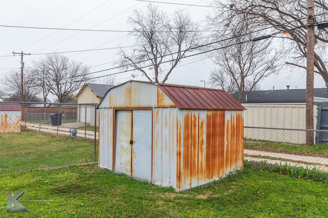 view of outdoor structure featuring a yard