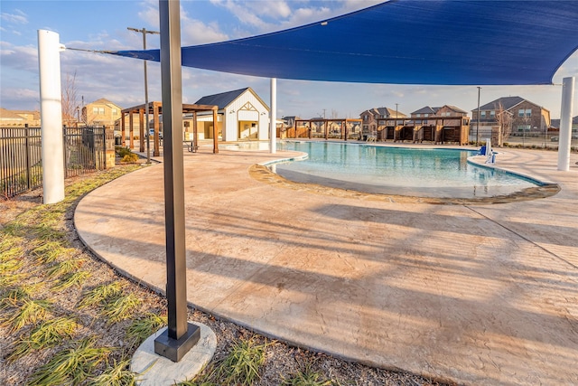 view of swimming pool featuring a patio