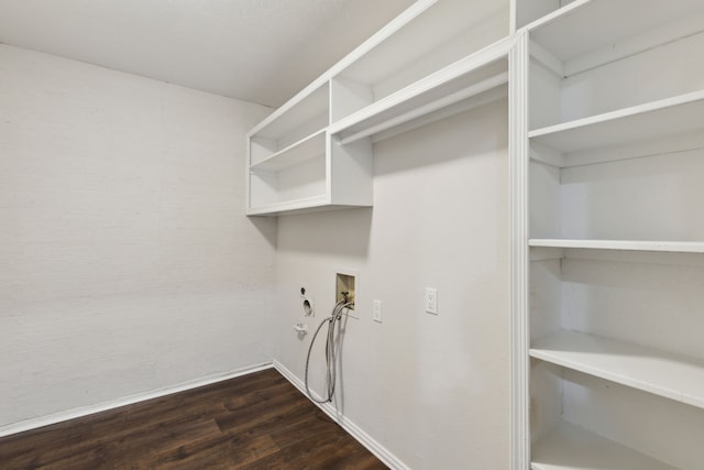 laundry room with hookup for a gas dryer, electric dryer hookup, dark hardwood / wood-style floors, and washer hookup