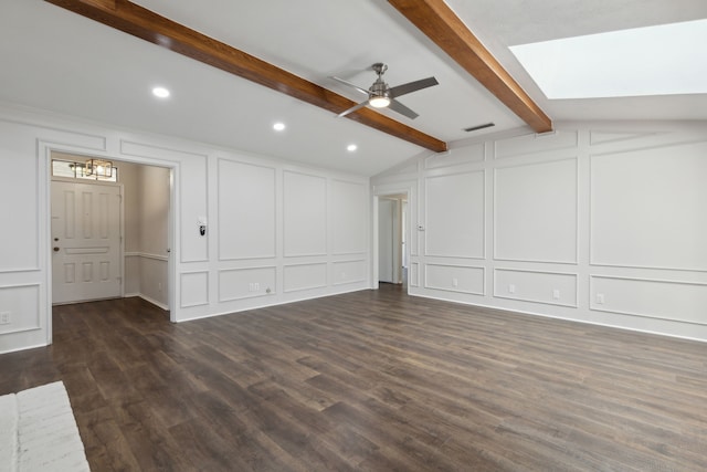 unfurnished living room featuring lofted ceiling with skylight, ceiling fan, and dark hardwood / wood-style flooring