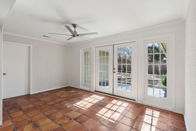 unfurnished room featuring ornamental molding, ceiling fan, and french doors