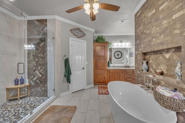 bathroom with vanity, ornamental molding, and shower with separate bathtub