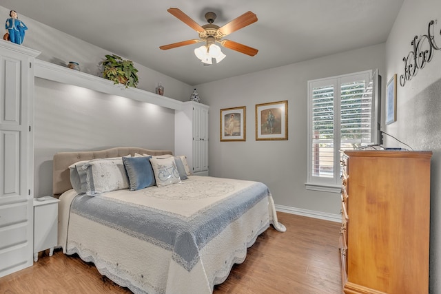 bedroom featuring ceiling fan and light wood-type flooring