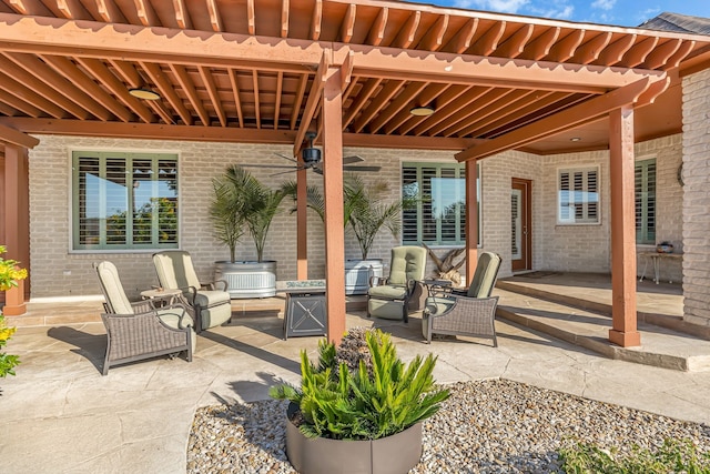 view of patio / terrace with ceiling fan