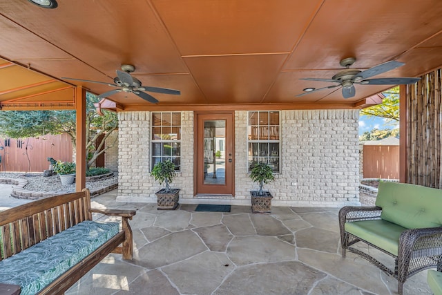 view of patio featuring ceiling fan