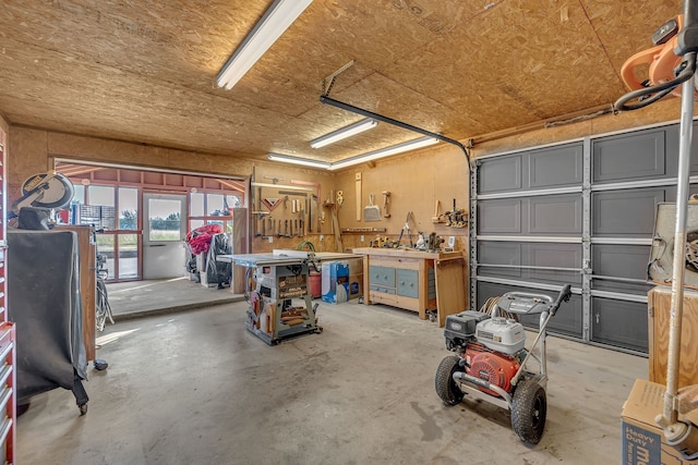 garage with a workshop area