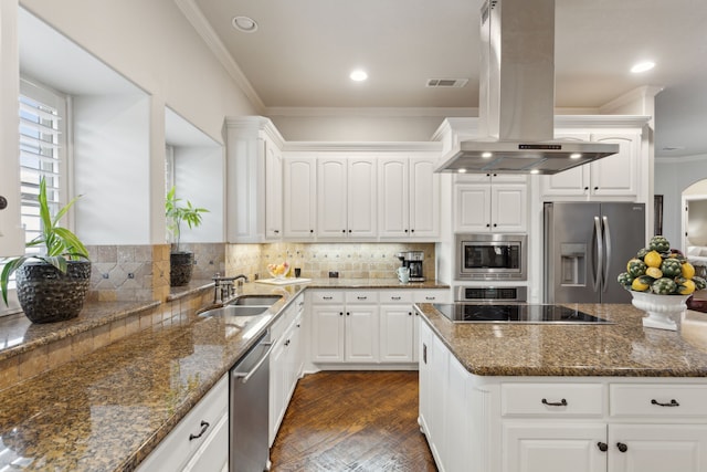 kitchen featuring white cabinetry, stainless steel appliances, and island range hood