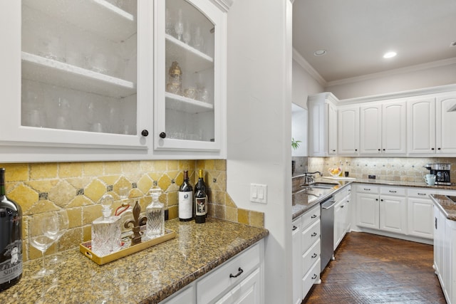 kitchen with sink, white cabinetry, crown molding, dishwasher, and dark stone counters