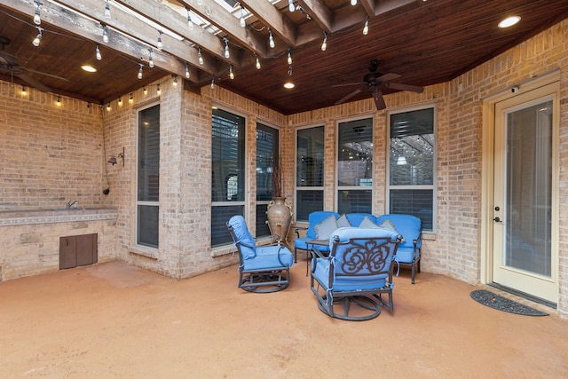 view of patio with ceiling fan