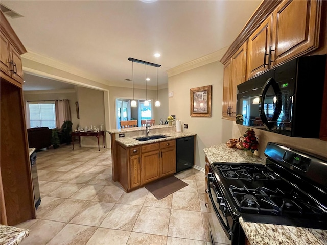 kitchen featuring sink, ornamental molding, black appliances, decorative light fixtures, and kitchen peninsula