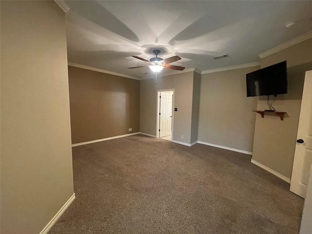 carpeted spare room with ornamental molding and ceiling fan