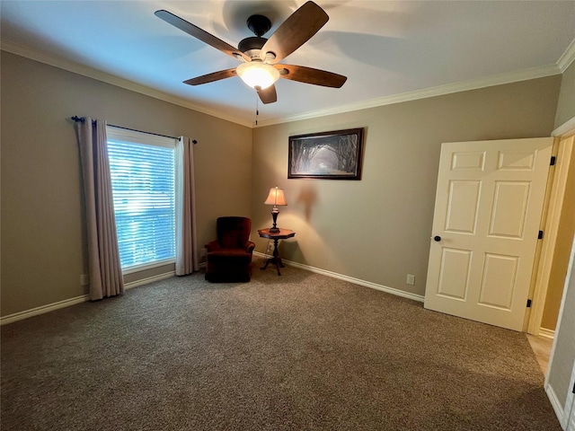 unfurnished room featuring ornamental molding, carpet, and ceiling fan