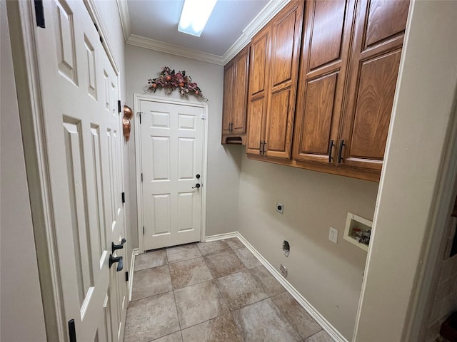 washroom featuring light tile patterned floors, cabinets, washer hookup, ornamental molding, and hookup for an electric dryer