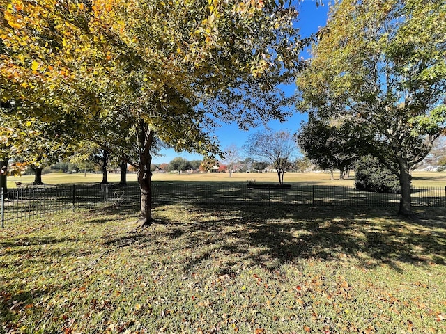 view of yard with a rural view