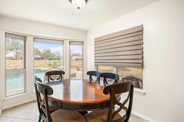 dining room featuring light tile patterned floors