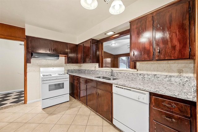 kitchen featuring extractor fan, sink, tasteful backsplash, white appliances, and light stone countertops