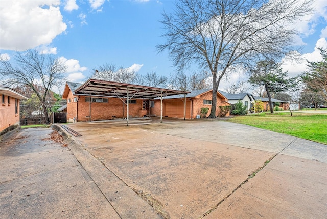 view of property exterior featuring a garage and a lawn