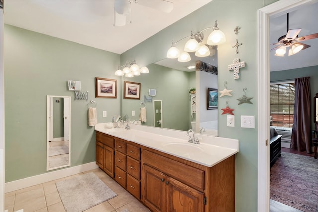 bathroom with vanity, tile patterned flooring, and ceiling fan