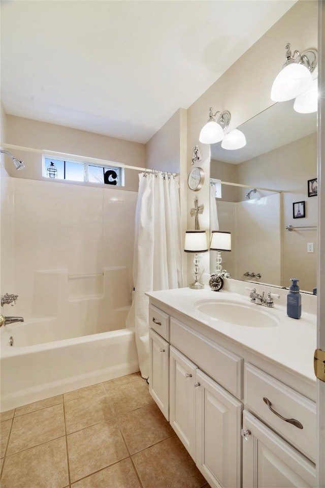 bathroom with tile patterned flooring, vanity, and shower / bath combo with shower curtain