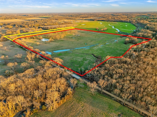 bird's eye view with a rural view and a water view