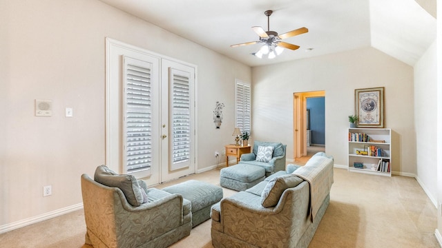 carpeted living room featuring lofted ceiling and ceiling fan