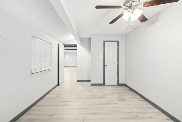 hall with light hardwood / wood-style floors