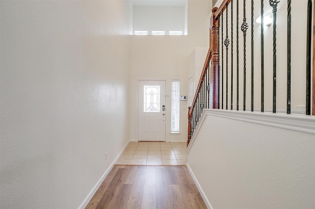 408 Elk Run Dr, Fort Worth, TX 76140 - foyer entrance featuring a high ceiling and light wood-type flooring