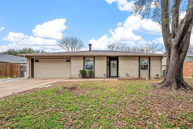 ranch-style house featuring a garage, concrete driveway, brick siding, and fence