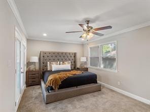 bedroom featuring ornamental molding, light carpet, and ceiling fan