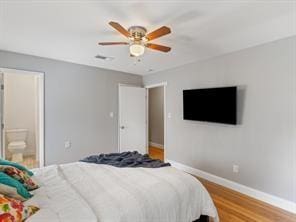 bedroom featuring ceiling fan and light hardwood / wood-style floors