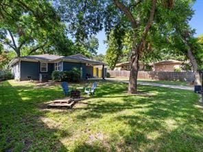 view of yard featuring a fire pit