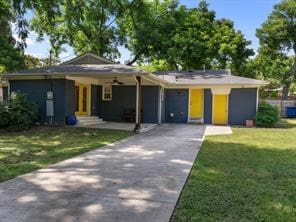 ranch-style house featuring a front lawn