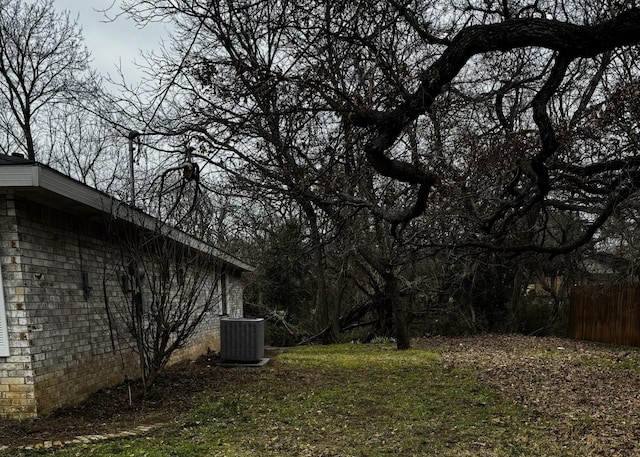 view of yard featuring central AC