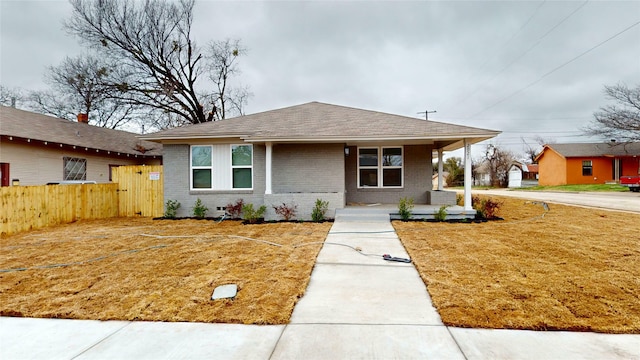 view of front facade with a porch and a front yard