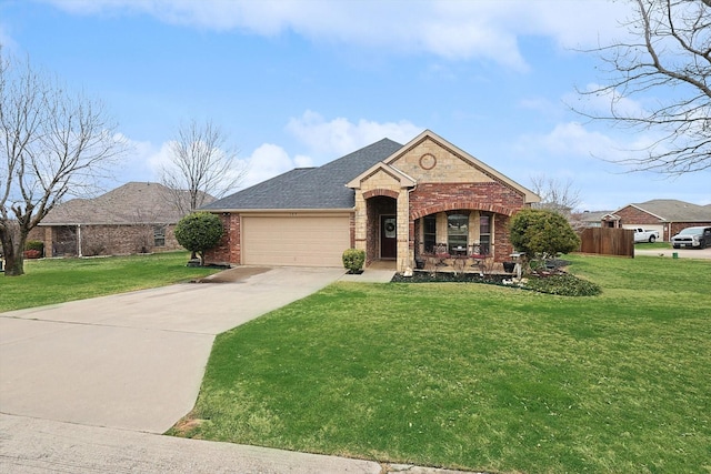 view of front of house with a garage and a front lawn